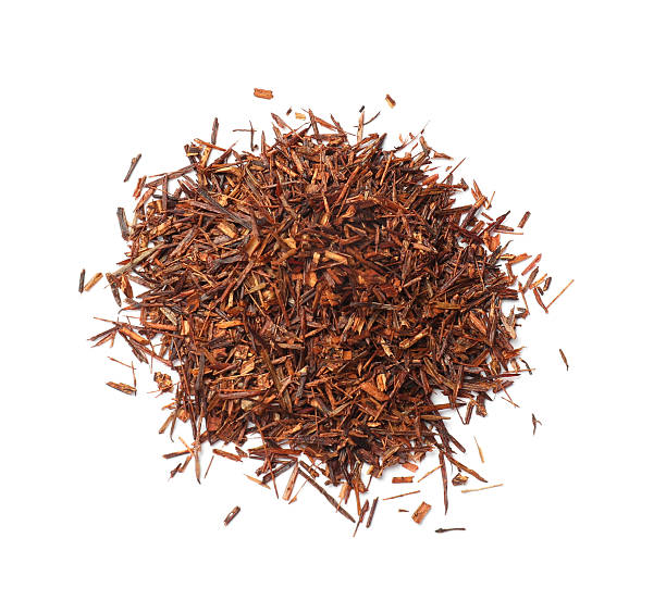 istock Heap of rooibos tea isolated on white, top view 2248145176