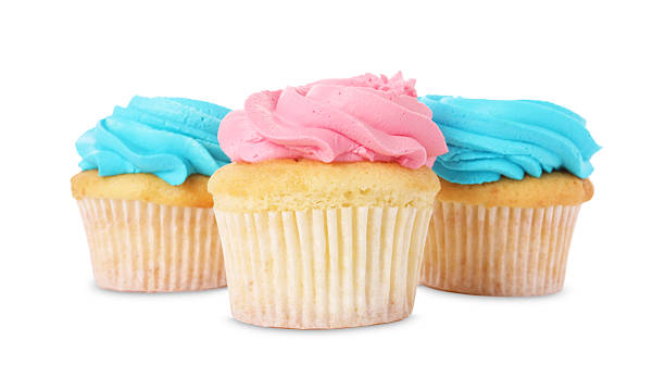 istock Delicious cupcakes with bright cream isolated on white 2248146038