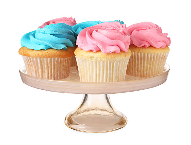 istock Delicious cupcakes with bright cream isolated on white 2248146049