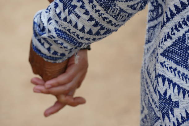 Close up of couple holding hands