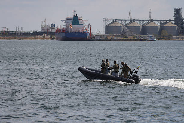 Constanta, Romania - September 1, 2025: Romanian Navy's special forces soldiers on a military inflatable boat.