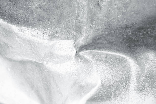 Closeup shiny stainless steel scratched sheet, abstract background with copy space, full frame horizontal composition