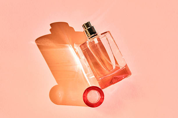 istock Pink perfume bottle on a pink background. 2248151327