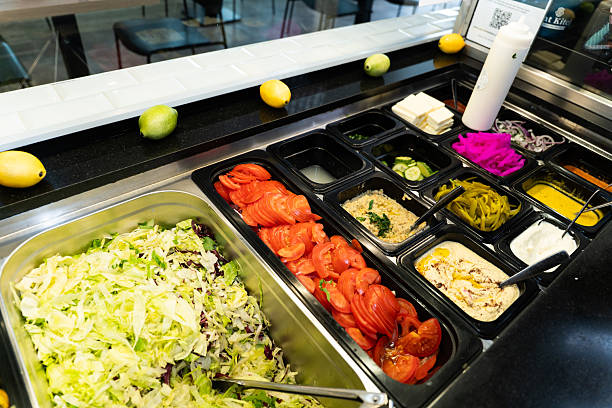 istock Salad bar with fresh vegetables and sauces 2248153690