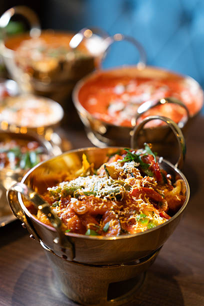 istock Traditional Indian Curry in Brass Bowl  Authentic Restaurant Style 2248153828