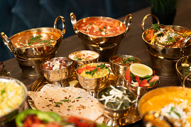 istock Traditional Indian thali meal with curries and bread 2248153884