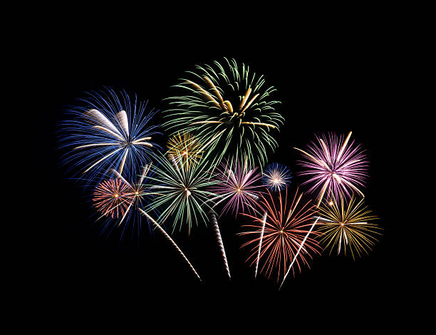 istock Festive colorful fireworks display isolated on black background 2248154661