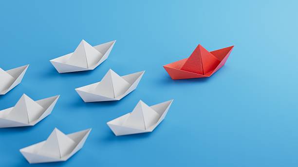 istock Different business concept.new ideas. paper art style. creative idea.Business competition concept with Colorful paper ships.3D rendering on blue background. 2248156231