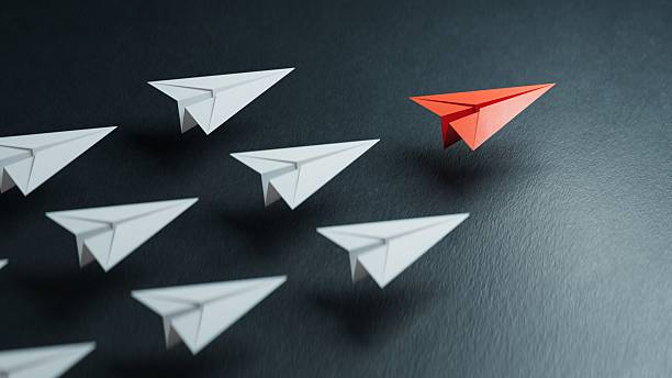 istock Different business concept.new ideas. paper art style. creative idea.Business competition concept with Colorful paper planes.3D rendering on black background. 2248156244
