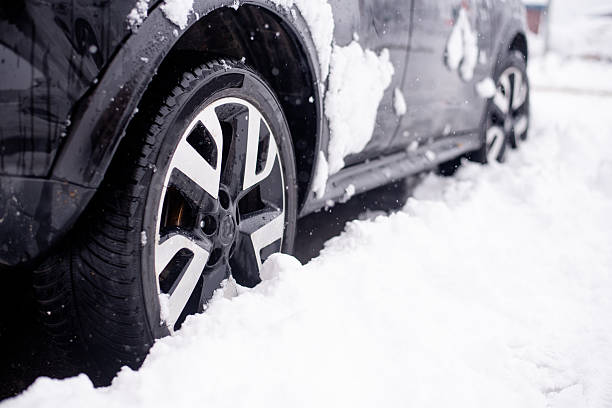 istock Car tyre on a snowy road in winter 2248156907
