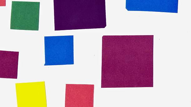 istock Abstract arrangement of colorful squares on a white background 2248157064