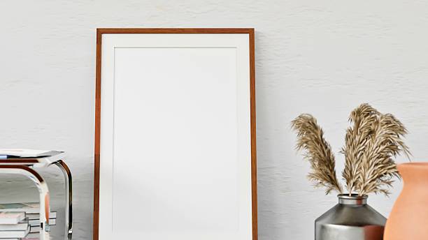 istock Minimalist interior with tall framed mirror and dried flowers 2248159422