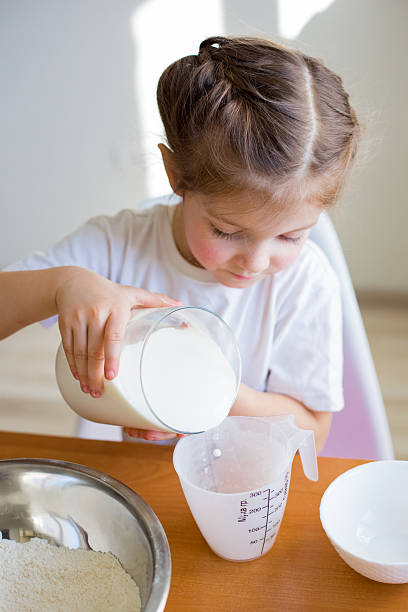 istock Cozy Kids Baking at Home 2248159514