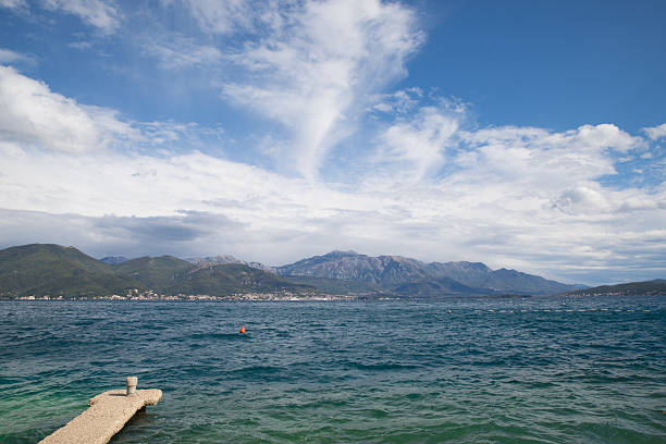 Empty beach at seaside at early autumn, Boka bay, Adriatic sea, Montenegro, Mediterranean