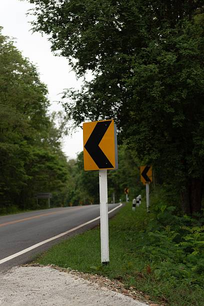istock Left curve chevron sign on roadside 2248165167