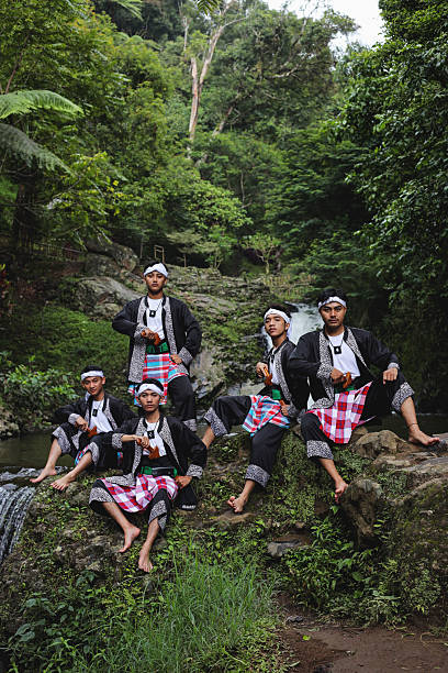 istock Traditional Young Men in Green Scenery 2248166142
