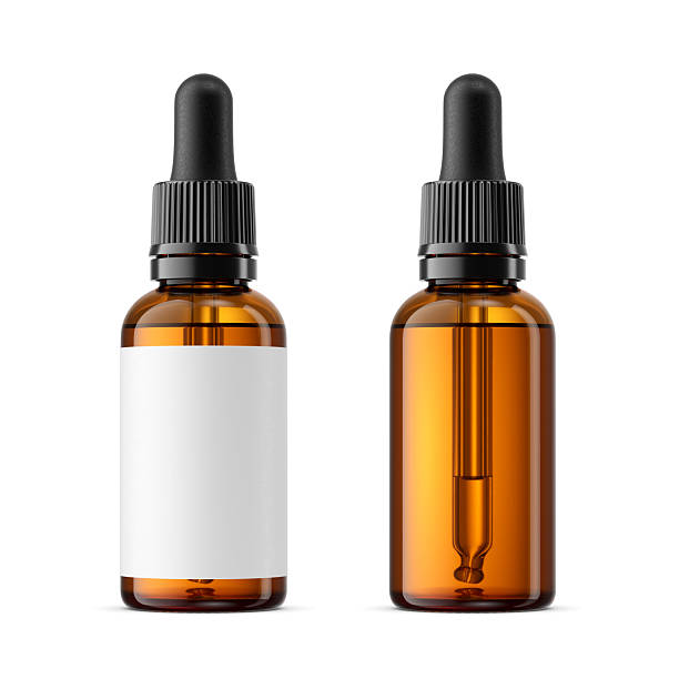 istock 30ml amber glass dropper bottles with blank label isolated on white. 3D rendering. 2248166529