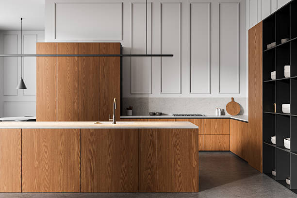 istock Modern kitchen interior design with wood cabinetry and minimalist white panel walls, featuring open shelving and integrated appliances. 3D Rendering 2248168772