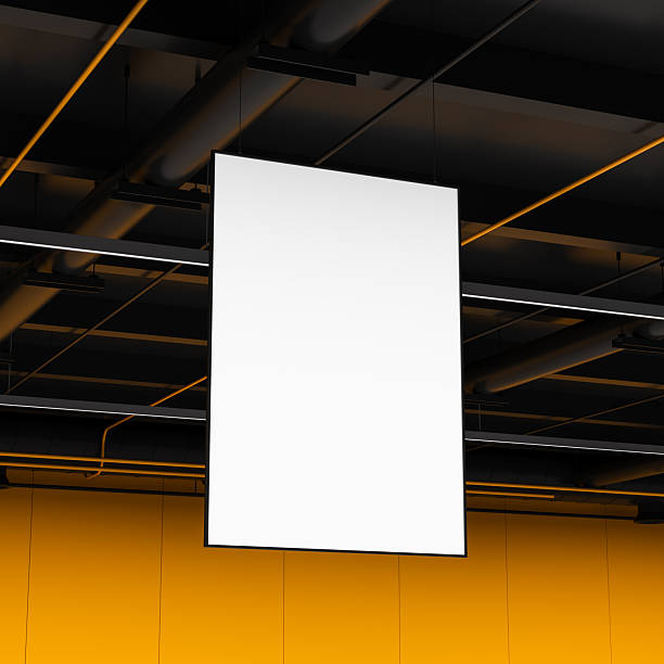 istock Vertical white advertising frame hanging from industrial ceiling with orange wall background in modern interior concept. 3D Rendering 2248169004