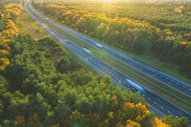 istock Traffic driving on a highway in nature during autumn 2248172006