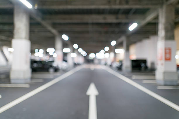 istock Blurred Underground Parking Lot Background | Perfect for Business Ads and Modern Design 2248174343