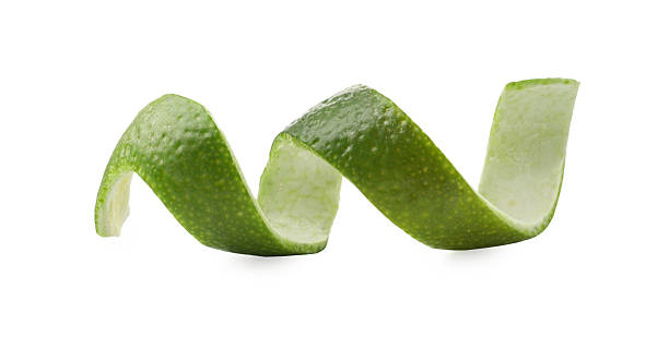 istock Twirl of lime peel isolated on white 2248174465
