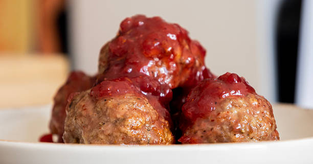 istock thanksgiving turkey meatballs with cranberry sauce in a dish 2248178018