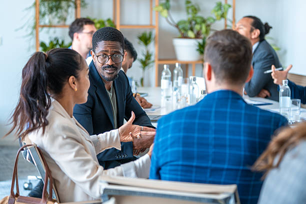 istock Diverse Business Professionals Engaging in a Bright Modern Boardroom Meeting 2248182306