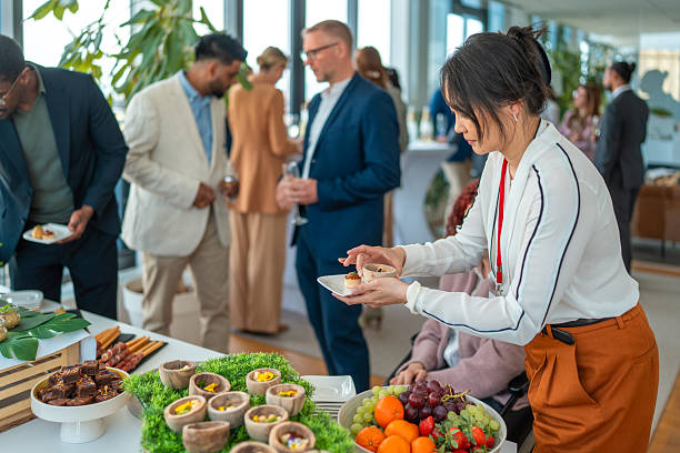 istock Professionals Engaged in Networking at a Corporate Lunch Gathering 2248183164