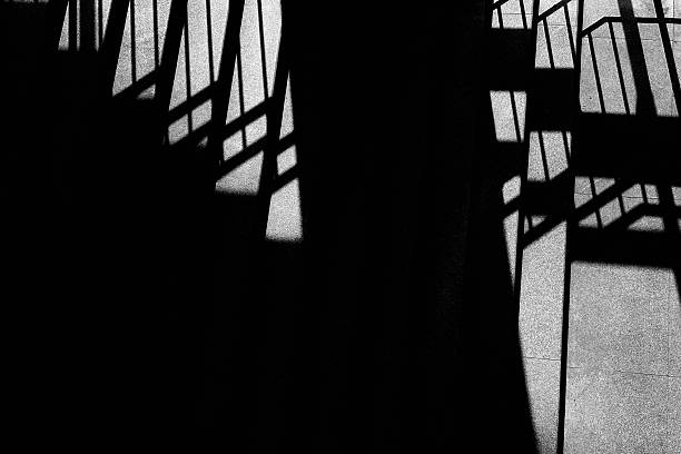 istock Abstract shadows on staircase in black and white 2248185473