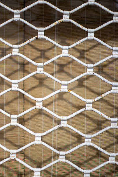 istock traditional local shutter security bars on a house wall in Mallorca 2248185666