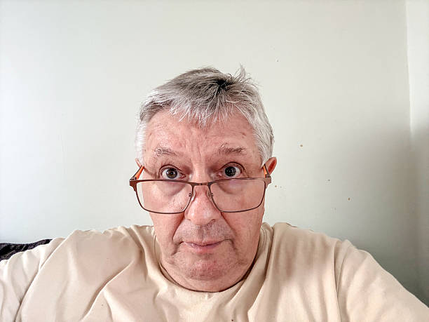 Senior Caucasian man selfie indoors