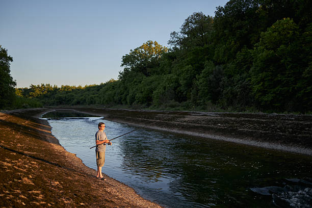 A person engaged in angling, a fishing technique that utilizes a fish hook attached to a fishing line to catch individual fish