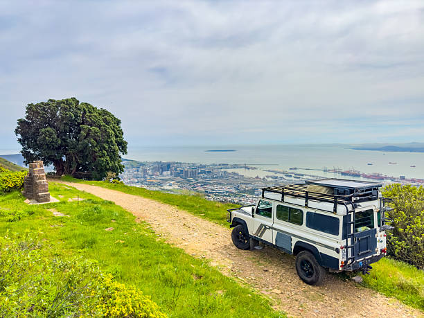 Cape Town, South Africa - September 19: Old Land Rover Defender parked on a mountain pass