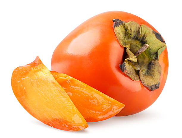istock Ripe persimmon and two slices close-up on a white. Isolated 2248190553