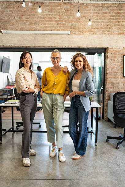 istock Diverse businesswomen smiling in modern loft office 2248197391