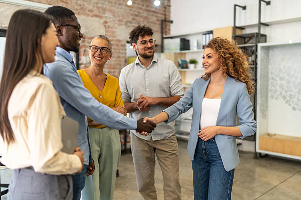 istock Business people shaking hands in office meeting 2248198009