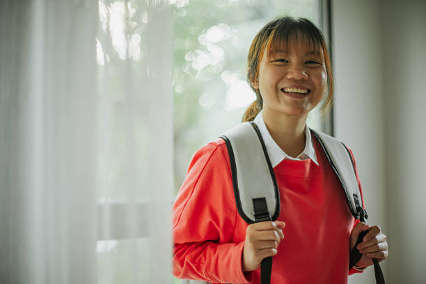 Portrait of a young asian woman student.