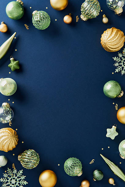 istock Christmas ornaments vertical border frame on a dark blue background 2248203609