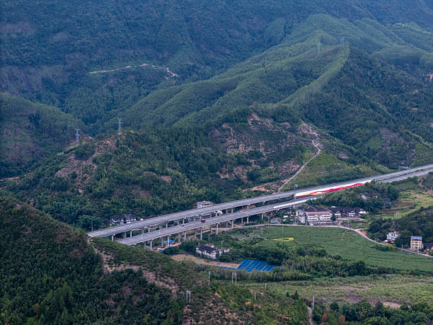 istock Mountainous Terrain with Road and Greenery 2248206822