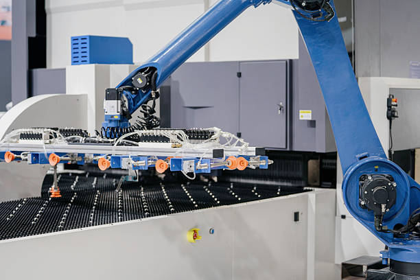 istock robot arm working in factory 2248209411