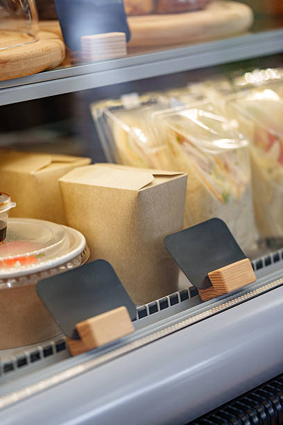 istock Takeaway food packaging displayed in a refrigerator with fresh meals ready to go 2248211725