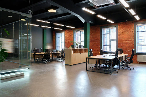 istock Modern office space with open layout and natural light in urban environment 2248211757