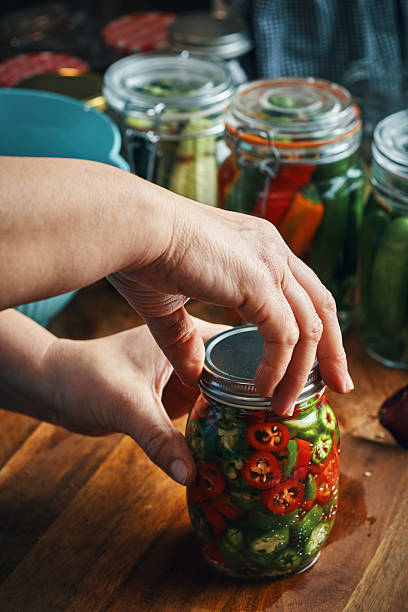 istock Fermented Foods - Preparing Fermented Mixed Chili Peppers 2248212111