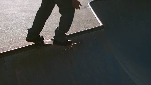 istock Male Skateboarder Dropping In on a Ramp 2248212598