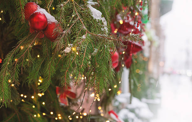 istock Festive pine tree decoration captured with a cozy, bokeh-filled Christmas background. 2248214368