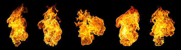 istock Isolated flame on black background, featuring bright orange movement and swirling heat pattern that fits energy themes, explosion effects, safety images and creative design projects. 2248215220