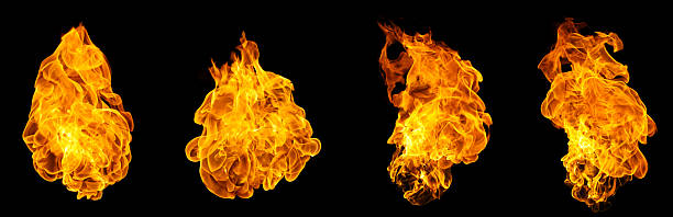 Isolated flame on black background, showing bright orange shape and intense heat movement. Suitable for energy themes, explosion concepts, visual effects and creative design projects.