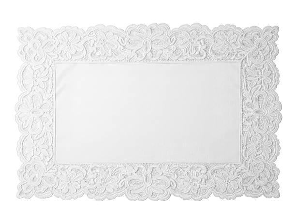 Elegant white lace placemat isolated PNG on transparent background, decorative table setting for special occasions and celebrations