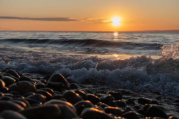 istock Picturesque, vibrant sunset on the water 2248218505